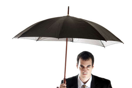 Isolated business man with umbrellaの写真素材