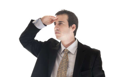 Isolated young business man watchingの写真素材