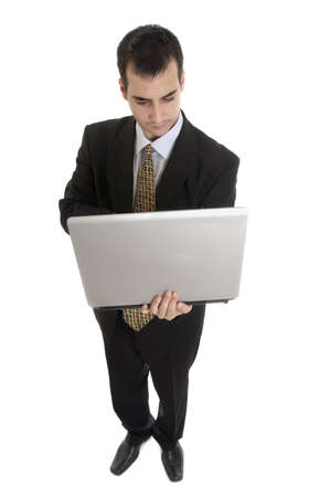Isolated thoughtful business man with laptopの写真素材