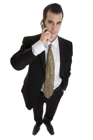 Isolated  business man speaking on phoneの写真素材