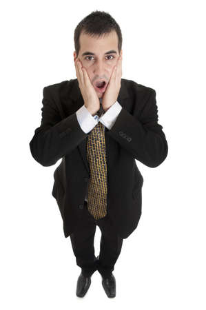 Isolated business man gesturing surprisedの写真素材