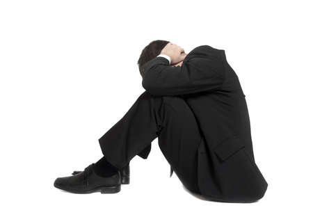 Isolated young business man on whiteの写真素材