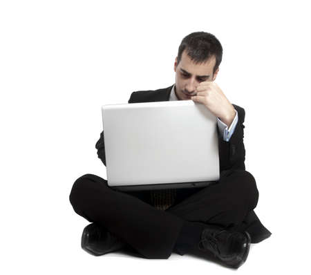 Isolated young business man on whiteの写真素材