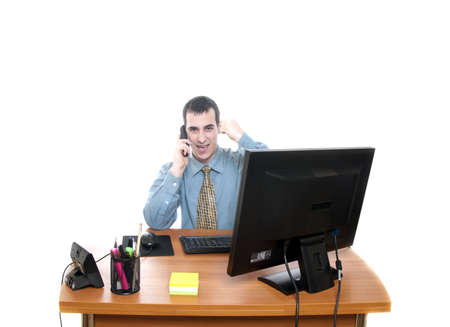 Isolated worker at office desk on white backgroundの写真素材