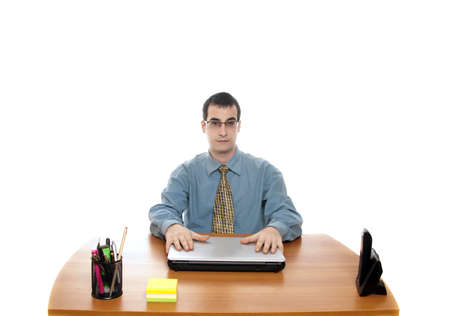 Isolated worker at office desk on white backgroundの写真素材