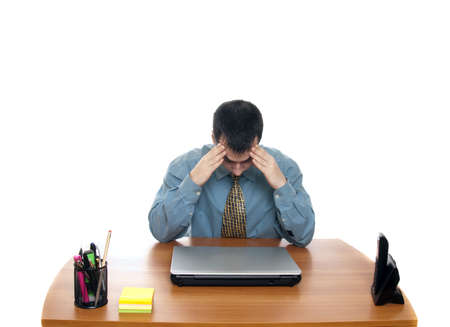 Isolated worker at office desk on white backgroundの写真素材