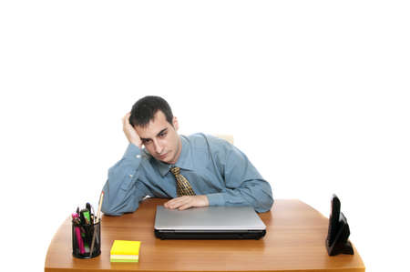 Isolated worker at office desk on white backgroundの写真素材