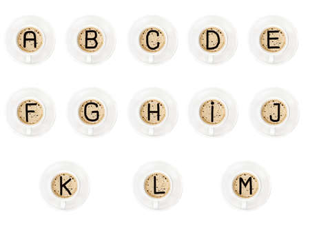A to M letters made on cup of coffeeの写真素材