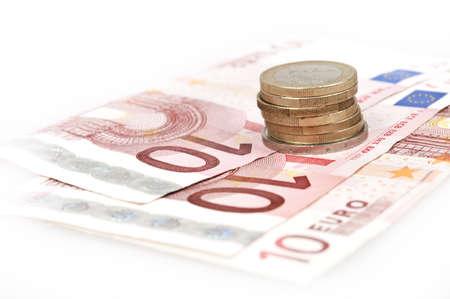 Euro banknotes and coins closeupの写真素材