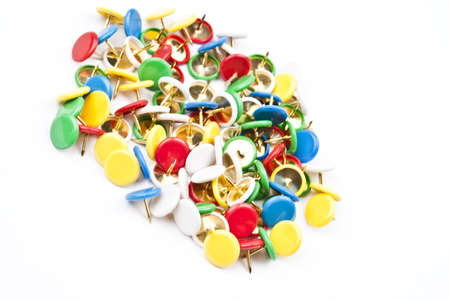 Many pushpins on white backgroundの写真素材