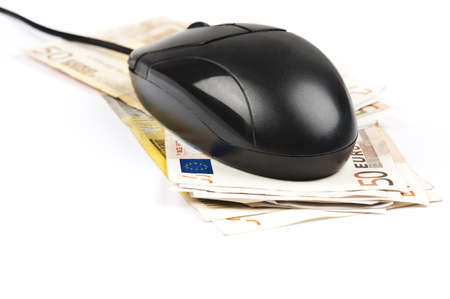 Closeup to mouse on euro banknotesの写真素材