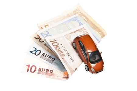 Red car on euro banknotes
