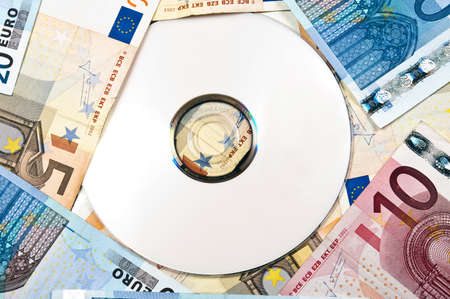 Cd on many euro banknotesの写真素材
