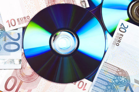 Cd on many euro banknotesの写真素材