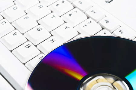 Cd on computer white keyboardの写真素材