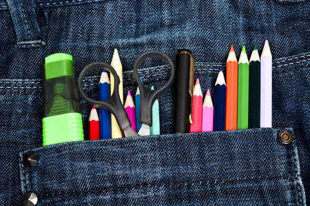 Office supplies on jeans pocketの写真素材