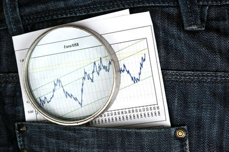 Jeans pocket with magnifying glass and exchange graphの写真素材