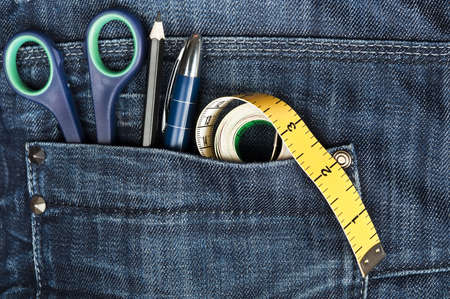 Closeup to jeans pocket with tailor toolsの写真素材