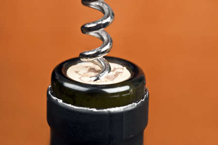 Corkscrew on an wine bottleの写真素材