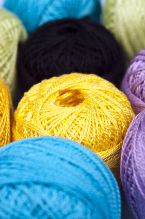 Thread on blue material background