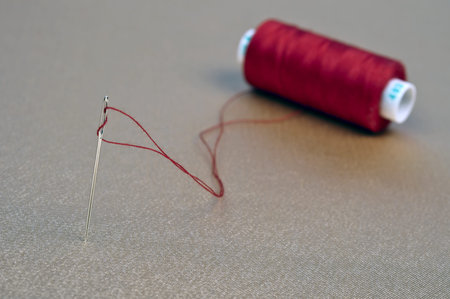 Red thread on gold material