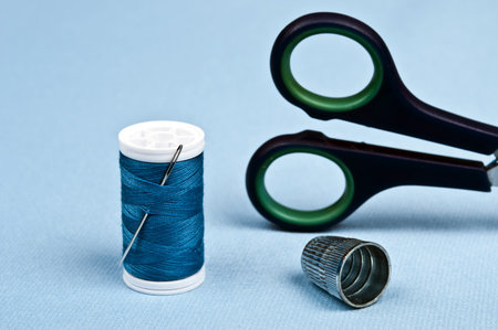 Tailor tools on blue material backgroundの写真素材