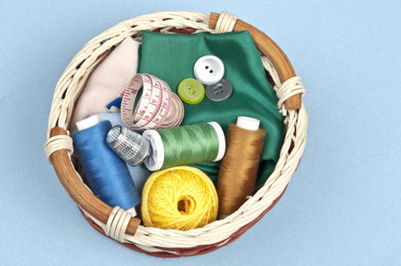 Tailor tools on blue material backgroundの写真素材