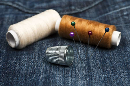 Thread on blue jeans materialの写真素材