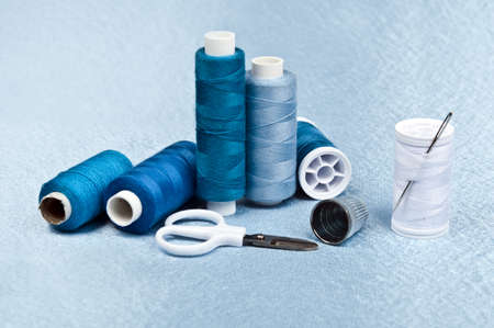 Tailor tools on blue material backgroundの写真素材