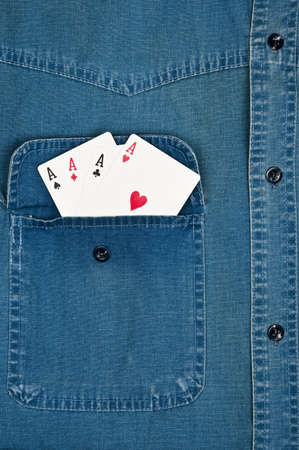Jeans shirt pocket with Acesの写真素材