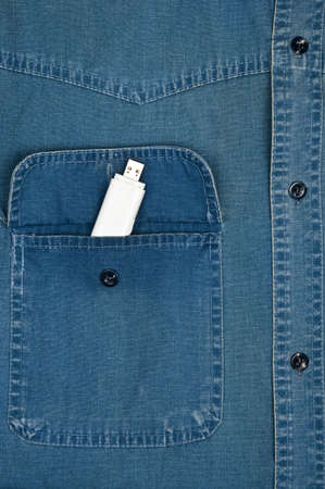 Jeans shirt pocket with usb driveの写真素材