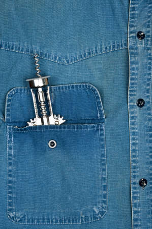 Jeans shirt pocket with corkscrewの写真素材