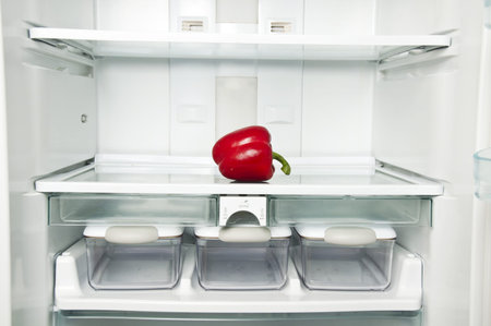 Refrigerator close up with red peperの写真素材