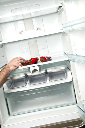Refrigerator close up with hot red pepperの写真素材