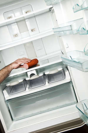 Refrigerator close up with salami cutの写真素材