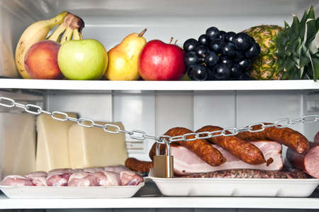 Refrigerator close up with meat shelf lockedの写真素材