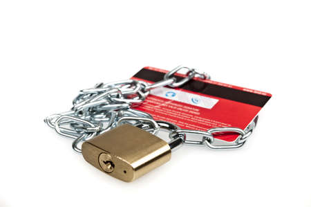 Padlock and credit card on whiteの写真素材