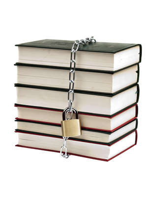 Padlock and book on whiteの写真素材