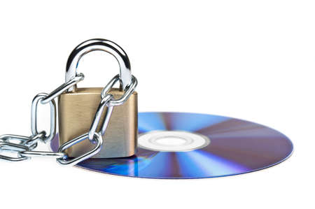 Padlock and cd on whiteの写真素材