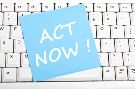 Act now mesage on keyboardの写真素材