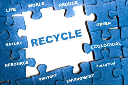 Recycle blue puzzle pieces assembledの写真素材