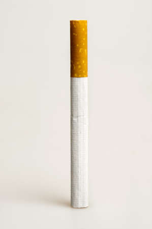 Isolated cigarette on white backgroundの写真素材