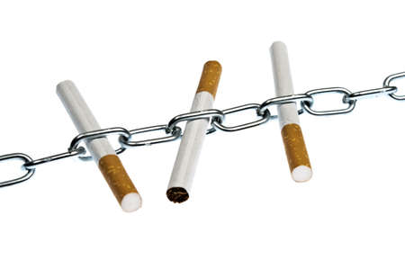Isolated cigarettes in chain on whiteの写真素材