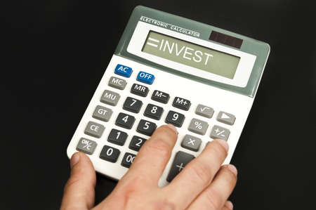 Invest word on electronic calculatorの写真素材