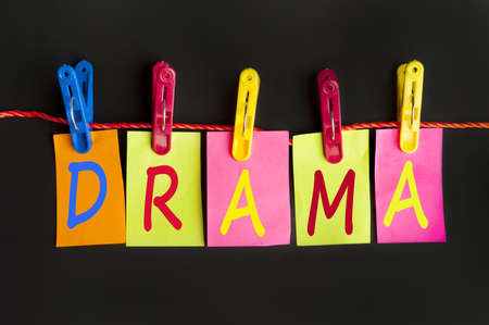 Drama word on laundry hook on black backgroundの写真素材