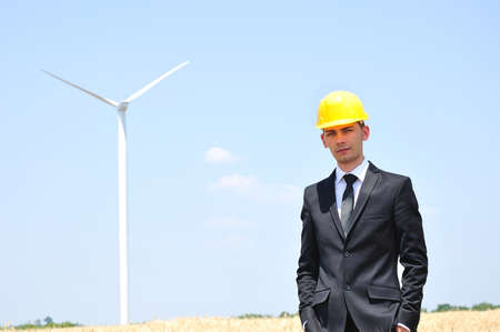 Young worker on wind farm の写真素材