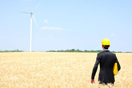Young worker on wind farm 