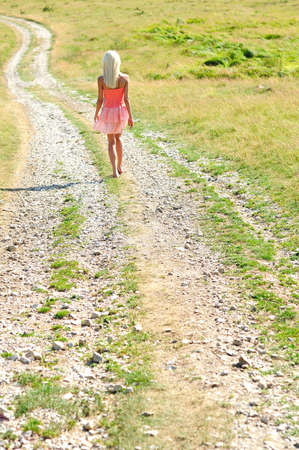 Young girl leave alone in natureの写真素材