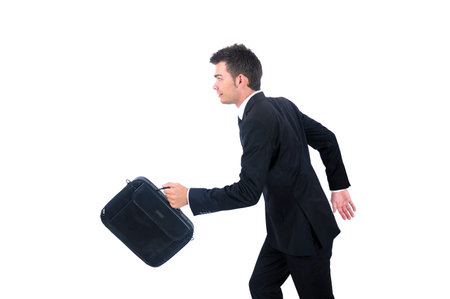 Isolated young business man runningの写真素材