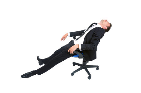 Isolated young business man sleepingの写真素材